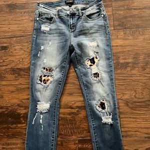 Judy Blue Jeans. With Leopard accents. Size 28.